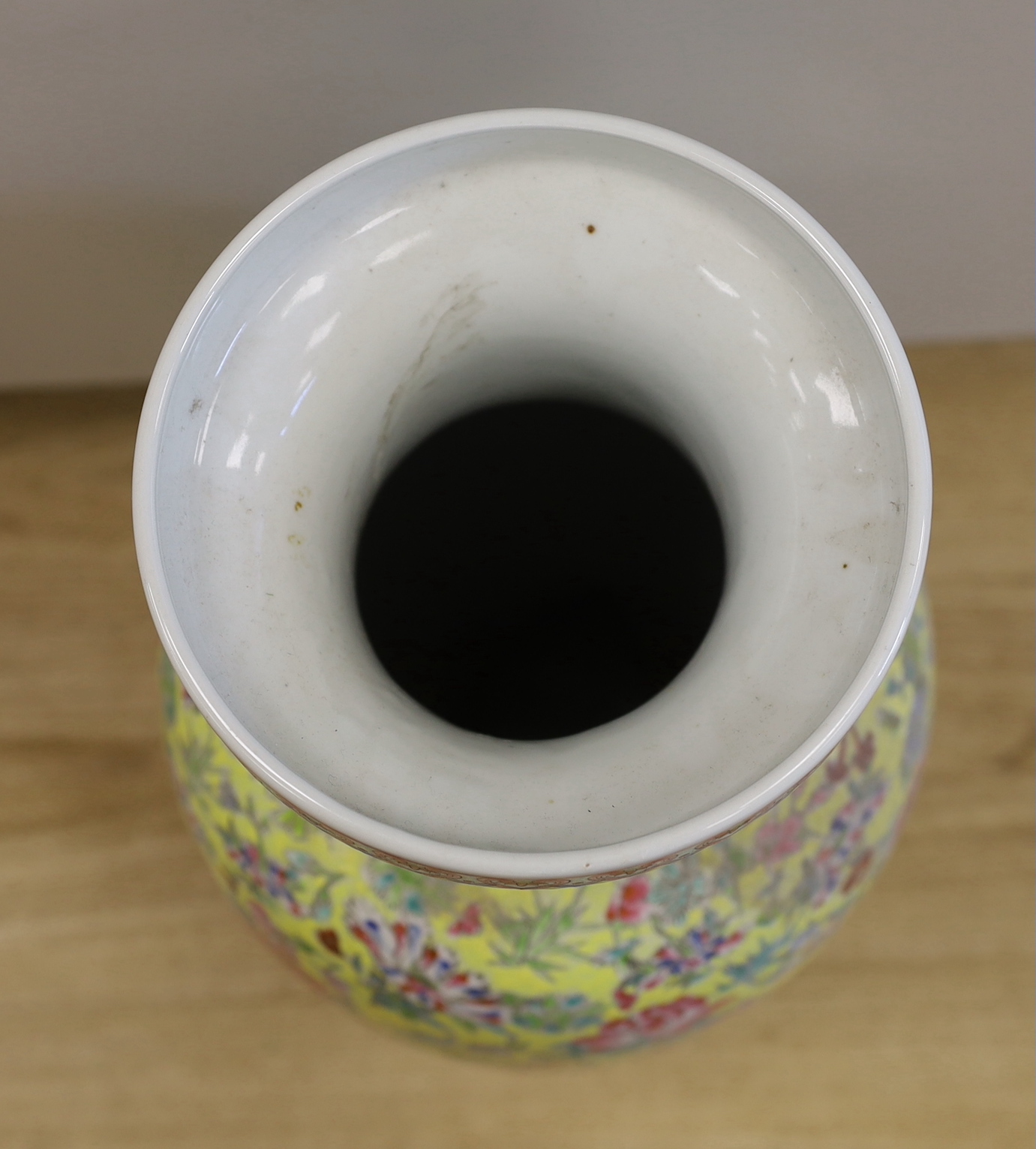 A large Chinese famille rose yellow ground baluster vase, 62cm high